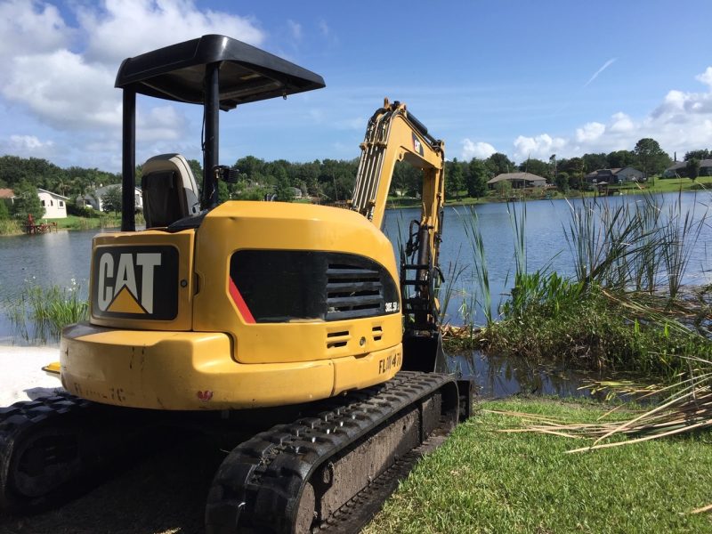 Lake Clearing and Cleanup Services in Florida » OKCC Services » Expert Debris Removal and Maintenance for Clean, Healthy Lakes » OKCCServices.com